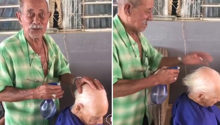 barbeiro borrifando água cabelo idoso