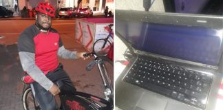 Tela e teclado de computador notebook e Homem em bicicleta de entrega de comida