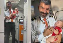 comissário de voo segura bebê no colo para que sua mãe pudesse tomar café e fazer um lanche