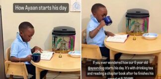 vídeo mostra rotina matinal de menino de 6 anos, ele toma chá enquanto lê um livro
