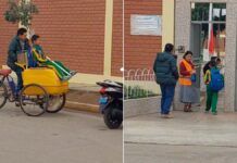 pai leva filho à escola em seu carrinho de sorvete